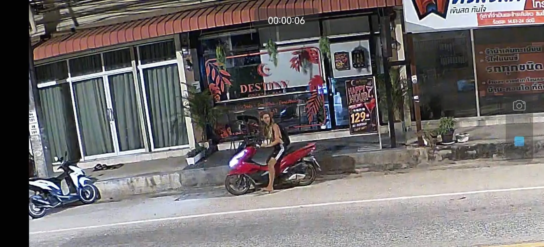 Broken shop window in Thong Sala