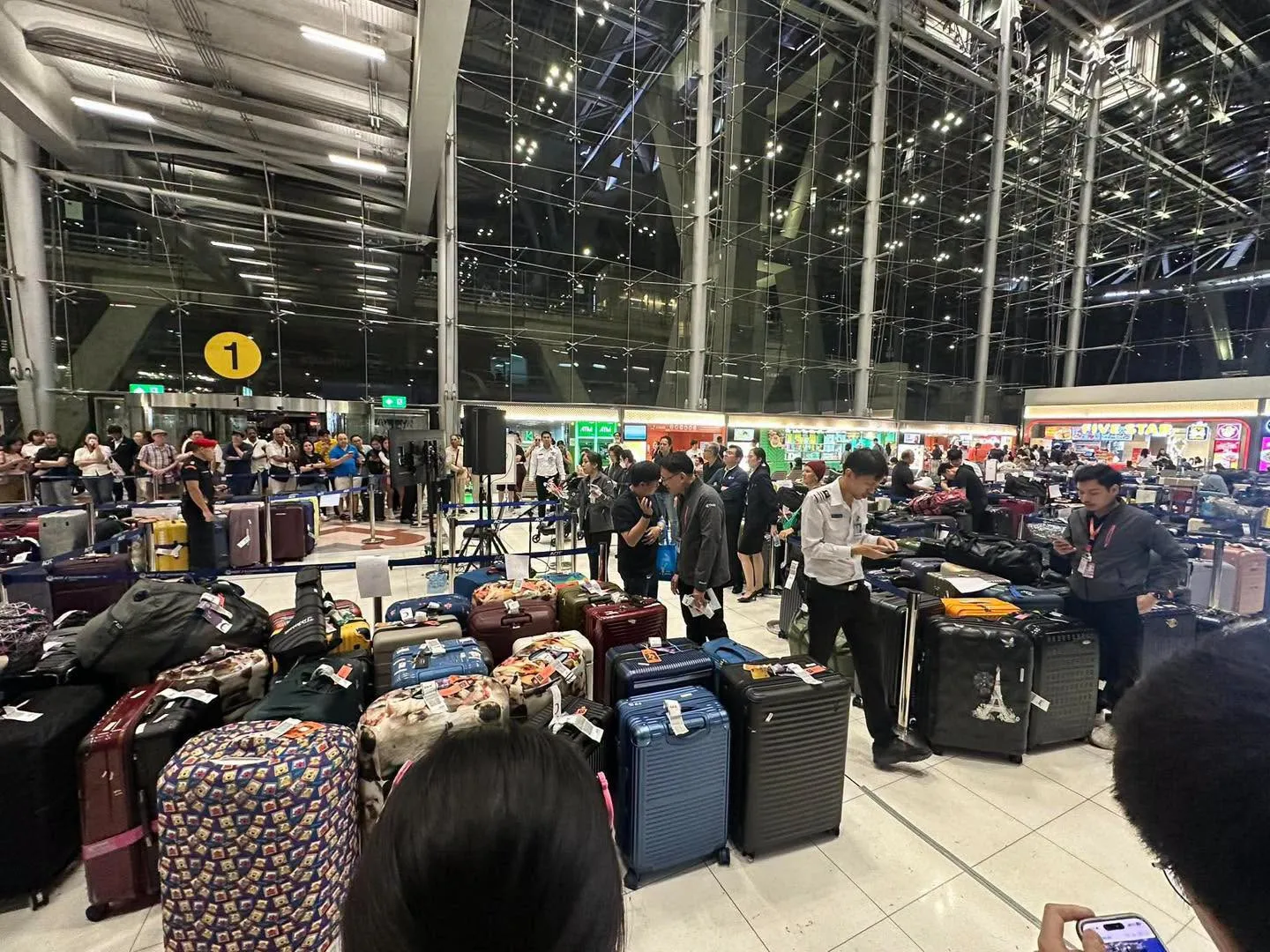 Luggage backlog at Suvarnabhumi Airport amid flooding